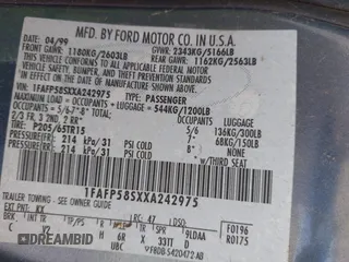 1999 Ford Taurus SE with VIN 1FAFP58SXXA242975, listed as a IAAI auction lot 42253538 with 228,824 mi miles and . Bid and sale history available at DreamBid. Image 9.
