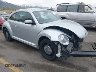 2013 Volkswagen Beetle with VIN 3VWHX7ATXDM658134, listed as a IAAI auction lot 42097779 with 47,901 mi miles and . Bid and sale history available at DreamBid. Image 1.