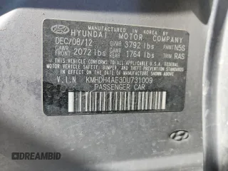 2013 Hyundai Elantra GLS z VIN KMHDH4AE3DU731009, wystawiony jako Copart lot #58668335 z przebiegiem 213 093 mil mil oraz Szkoda całkowita • Salvage title. Historia ofert i sprzedaży dostępna na DreamBid. Obrazek 12.
