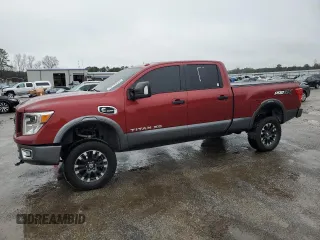 2017 Nissan Titan XD PRO-4X with VIN 1N6BA1F43HN570446, listed as a Copart auction lot 48192675 with 130,423 mi miles and Salvage Title. Bid and sale history available at carsss.com. Image 1.
