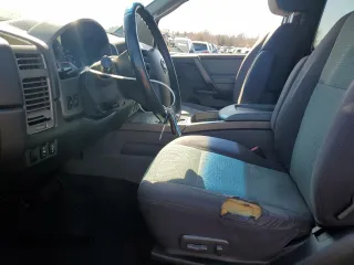 2006 Nissan Titan SE with VIN 1N6AA06A06N570395, listed as a Copart auction lot 48061925 with 131,059 mi miles and Salvage title. Bid and sale history available at DreamBid. Image 7.