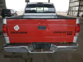 2002 Dodge Dakota SLT z VIN 1B7HL48N42S519724, wystawiony jako Copart lot #55533895 z przebiegiem 313 644 mil mil oraz Tytuł czysty. Historia ofert i sprzedaży dostępna na DreamBid. Obrazek 6.