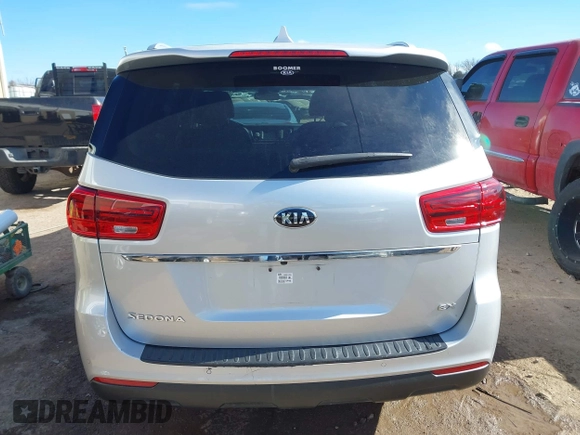 2021 Kia Sedona EX with VIN KNDMB5C11M6664811, listed as a IAAI auction lot 41390328 with 128,568 mi miles. Bid and sale history available at carsss.com. Image 17.