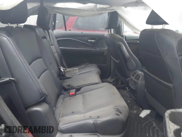 2021 Honda Pilot EX-L with VIN 5FNYF6H59MB021022, listed as a IAAI auction lot 42713636 with Not provided miles and . Bid and sale history available at DreamBid. Image 8.