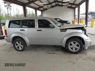 2011 Dodge Nitro SXT z VIN 1D4PU5GK8BW579099, wystawiony jako IAAI lot #42141424 z przebiegiem 92 726 mil mil oraz . Historia ofert i sprzedaży dostępna na DreamBid. Obrazek 13.