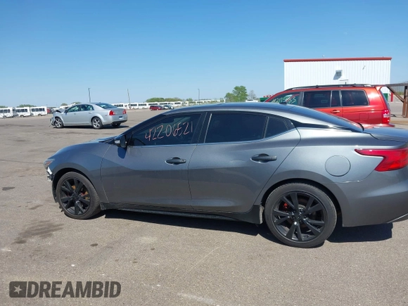 2018 Nissan Maxima SL with VIN 1N4AA6AP9JC360485, listed as a IAAI auction lot 42206521 with 140,898 mi miles and . Bid and sale history available at DreamBid. Image 14.
