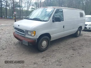 2001 Ford Econoline Cargo with VIN 1FTRE14261HA74696, listed as a IAAI auction lot 41915335 with 124,282 mi miles. Bid and sale history available at carsss.com. Image 2.