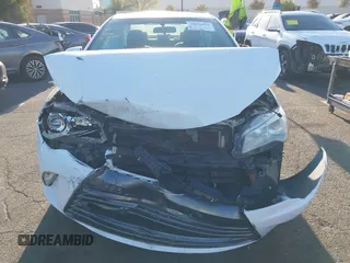 2015 Toyota Camry XLE with VIN 4T1BF1FK9FU923208, listed as a IAAI auction lot 42076970 with 124,096 mi miles and . Bid and sale history available at carsss.com. Image 12.