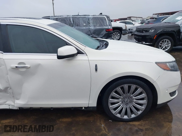 2013 Lincoln MKS with VIN 1LNHL9DK4DG605058, listed as a IAAI auction lot 41068489 with 101,801 mi miles. Bid and sale history available at carsss.com. Image 20.