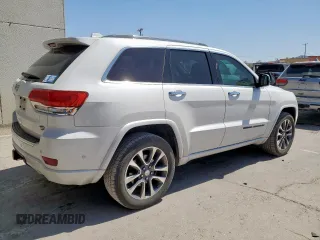 2017 Jeep Grand Cherokee Overland z VIN 1C4RJFCT5HC612721, wystawiony jako Copart lot #57652865 z przebiegiem 103 690 mil mil oraz Tytuł czysty. Historia ofert i sprzedaży dostępna na DreamBid. Obrazek 3.