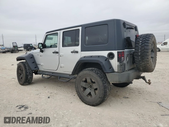 2009 Jeep Wrangler Unlimited Rubicon with VIN 1J8GA69169L731787, listed as a Copart auction lot 44604125 with 180,861 mi miles and Salvage title. Bid and sale history available at DreamBid. Image 2.