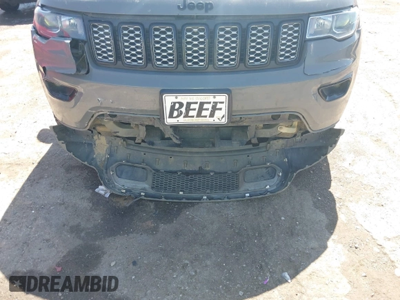 2019 Jeep Grand Cherokee Laredo E with VIN 1C4RJFAG8KC849782, listed as a IAAI auction lot 42151331 with 141,099 mi miles and . Bid and sale history available at DreamBid. Image 17.