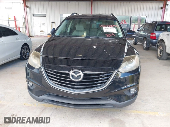 2014 Mazda CX-9 Grand Touring z VIN JM3TB2DA3E0439407, wystawiony jako IAAI lot #42332095 z przebiegiem 108 333 mil mil oraz . Historia ofert i sprzedaży dostępna na DreamBid. Obrazek 6.