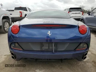 2013 Ferrari California z VIN ZFF65THA9D0194738, wystawiony jako Copart lot #77637104 z przebiegiem 28 670 mil mil oraz Nie do naprawy. Historia ofert i sprzedaży dostępna na DreamBid. Obrazek 6.
