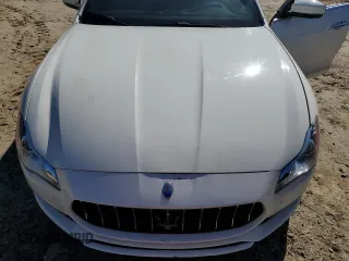 2017 Maserati Quattroporte z VIN ZAM56RRL1H1230279, wystawiony jako Copart lot #67067924 z przebiegiem Nie podano mil oraz Czysty tytuł • Clean title. Historia ofert i sprzedaży dostępna na DreamBid. Obrazek 11.