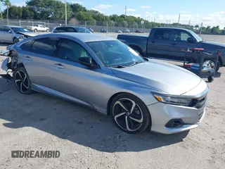 2022 Honda Accord Sedan Sport SE with VIN 1HGCV1F48NA046600, listed as a IAAI auction lot 41510584 with 140,952 mi miles. Bid and sale history available at carsss.com. Image 1.