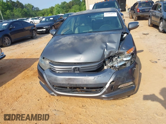2010 Honda Insight EX with VIN JHMZE2H74AS027020, listed as a IAAI auction lot 42394875 with 248,003 mi miles and . Bid and sale history available at DreamBid. Image 12.