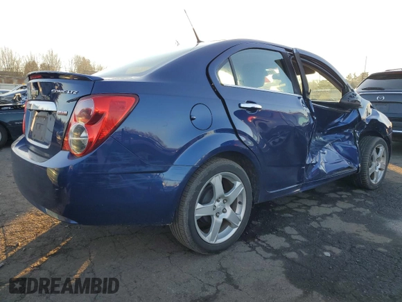 2014 Chevrolet Sonic LTZ with VIN 1G1JE5SB8E4219086, listed as a Copart auction lot 88990405 with 96,177 mi miles and Salvage Title. Bid and sale history available at carsss.com. Image 3.