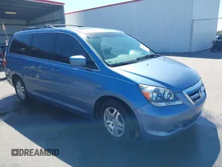 2007 Honda Odyssey EX-L z VIN 5FNRL38747B089343, wystawiony jako IAAI lot #41852907 z przebiegiem 278 380 mil mil oraz . Historia ofert i sprzedaży dostępna na DreamBid. Obrazek 1.