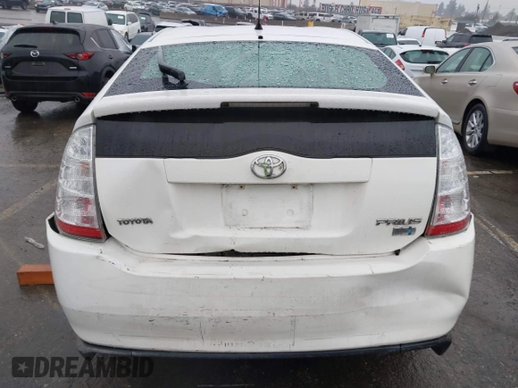 2007 Toyota Prius z VIN JTDKB20U177622142, wystawiony jako IAAI lot #41720920 z przebiegiem 140 665 mil mil oraz . Historia ofert i sprzedaży dostępna na DreamBid. Obrazek 16.