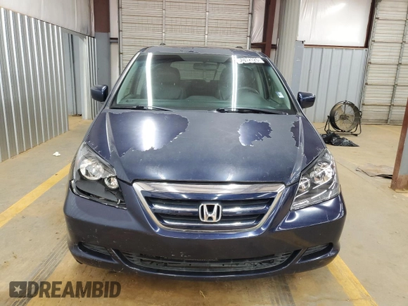 2005 Honda Odyssey EX-L with VIN 5FNRL38785B054186, listed as a Copart auction lot 58072125 with 219,928 mi miles and Salvage title. Bid and sale history available at DreamBid. Image 5.