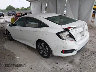 2017 Honda Civic EX-L z VIN 19XFC1F78HE025582, wystawiony jako IAAI lot #42432134 z przebiegiem 144 688 mil mil oraz . Historia ofert i sprzedaży dostępna na DreamBid. Obrazek 3.