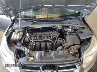 2012 Ford Focus SE with VIN 1FAHP3F28CL114572, listed as a Copart auction lot 63053035 with 142,994 mi miles and Salvage title. Bid and sale history available at DreamBid. Image 11.