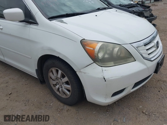 2010 Honda Odyssey EX-L z VIN 5FNRL3H78AB030254, wystawiony jako IAAI lot #42742510 z przebiegiem 277 913 mil mil oraz . Historia ofert i sprzedaży dostępna na DreamBid. Obrazek 12.