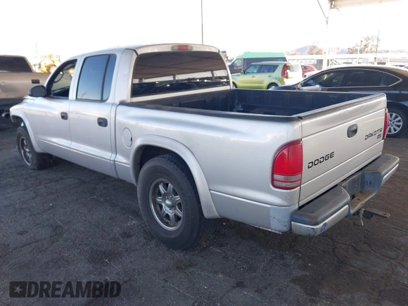 2003 Dodge Dakota SLT with VIN 1D7HL48N13S294573, listed as a IAAI auction lot 41291127 with 227,355 mi miles. Bid and sale history available at carsss.com. Image 3.