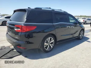 2021 Honda Odyssey Touring with VIN 5FNRL6H80MB036564, listed as a Copart auction lot 52218215 with 44,556 mi miles and Salvage Title. Bid and sale history available at carsss.com. Image 3.