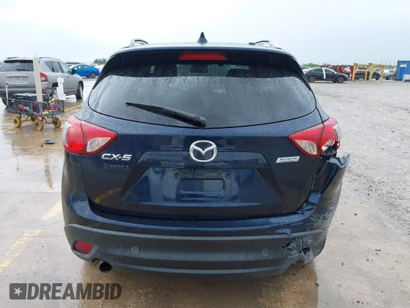 2015 Mazda CX-5 Touring with VIN JM3KE2CY5F0449195, listed as a IAAI auction lot 41894567 with 124,694 mi miles and . Bid and sale history available at DreamBid. Image 16.