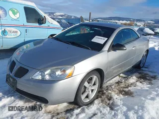 2006 Pontiac G6 GT with VIN 1G2ZH358864245408, listed as a IAAI auction lot 41609030 with 153,168 mi miles and . Bid and sale history available at DreamBid. Image 2.