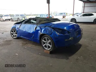 2005 Nissan 350Z Touring with VIN JN1AZ36A45M753058, listed as a IAAI auction lot 41563023 with 1 mi miles. Bid and sale history available at carsss.com. Image 3.