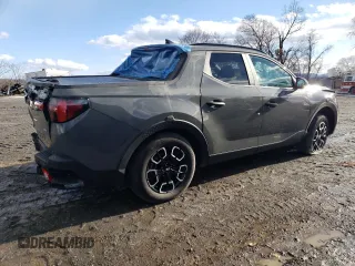 2023 Hyundai Santa Cruz SEL z VIN 5NTJCDAE4PH065039, wystawiony jako Copart lot #58940925 z przebiegiem 18 129 mil mil oraz Szkody całkowita. Historia ofert i sprzedaży dostępna na DreamBid. Obrazek 3.