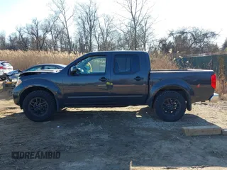 2015 Nissan Frontier Pro-4X with VIN 1N6AD0EV6FN708016, listed as a IAAI auction lot 41660814 with 86,676 mi miles and . Bid and sale history available at DreamBid. Image 14.