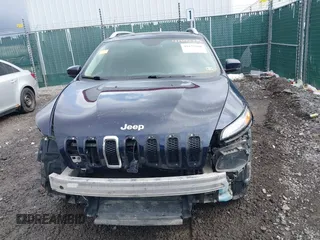 2016 Jeep Cherokee Limited with VIN 1C4PJMDB2GW181432, listed as a IAAI auction lot 41675868 with 106,979 mi miles. Bid and sale history available at carsss.com. Image 13.