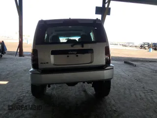 2011 Jeep Liberty Sport with VIN 1J4PN2GK5BW550971, listed as a Copart auction lot 49921095 with 141,877 mi miles and Salvage Title. Bid and sale history available at DreamBid. Image 6.