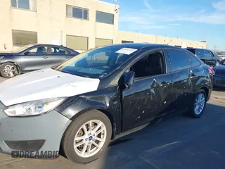 2015 Ford Focus SE with VIN 1FADP3F29FL350473, listed as a IAAI auction lot 41032182 with 102,898 mi miles. Bid and sale history available at carsss.com. Image 6.