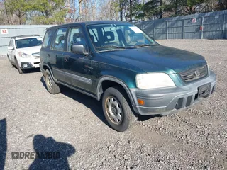 2001 Honda CR-V LX with VIN JHLRD18431C016561, listed as a IAAI auction lot 41770542 with 135,447 mi miles. Bid and sale history available at carsss.com. Image 1.