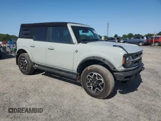 2023 Ford Bronco with VIN 1FMEE5BP0PLC06549, listed as a Copart auction lot 58703305 with 28,051 mi miles and Salvage title. Bid and sale history available at DreamBid. Image 4.