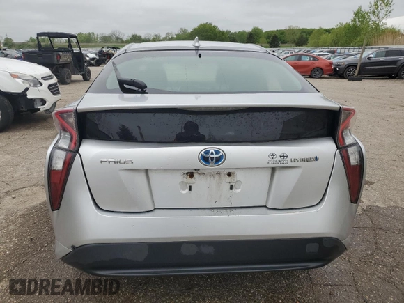 2016 Toyota Prius Two z VIN JTDKBRFU8G3006171, wystawiony jako Copart lot #57156035 z przebiegiem 228 265 mil mil oraz Czysty tytuł • Clean title. Historia ofert i sprzedaży dostępna na DreamBid. Obrazek 6.