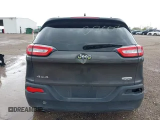 2014 Jeep Cherokee Altitude with VIN 1C4PJMCB2EW181848, listed as a IAAI auction lot 41638004 with 175,813 mi miles. Bid and sale history available at carsss.com. Image 16.