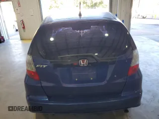 2009 Honda Fit with VIN JHMGE88279S059230, listed as a Copart auction lot 81409304 with 140,991 mi miles and Clean Title. Bid and sale history available at carsss.com. Image 6.
