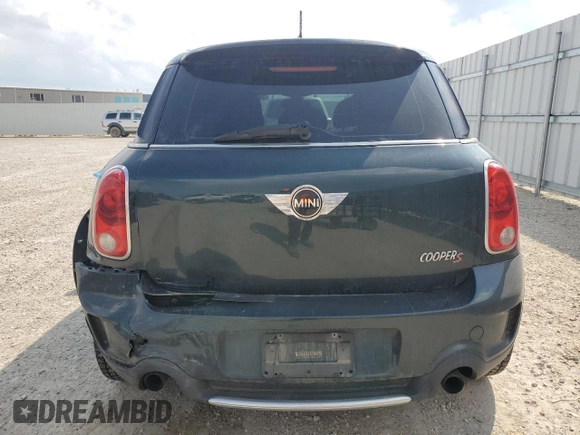 2012 MINI Countryman S with VIN WMWZC5C54CWL57554, listed as a Copart auction lot 59699865 with 144,737 mi miles and Salvage title. Bid and sale history available at DreamBid. Image 6.
