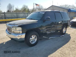 2001 GMC Yukon SLT with VIN 1GKEK13TX1J168370, listed as a Copart auction lot 50636635 with 276,374 mi miles and Salvage Title. Bid and sale history available at carsss.com. Image 1.