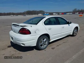 2004 Pontiac Grand Am SE1 with VIN 1G2NF52EX4M594173, listed as a IAAI auction lot 41812409 with 130,793 mi miles. Bid and sale history available at carsss.com. Image 4.