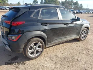 2023 Hyundai Kona SEL with VIN KM8K62AB0PU938484, listed as a IAAI auction lot 41722445 with 52,058 mi miles and . Bid and sale history available at DreamBid. Image 4.