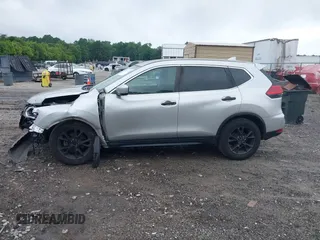 2017 Nissan Rogue SV with VIN KNMAT2MT7HP566140, listed as a IAAI auction lot 42507432 with 166,534 mi miles and . Bid and sale history available at DreamBid. Image 15.