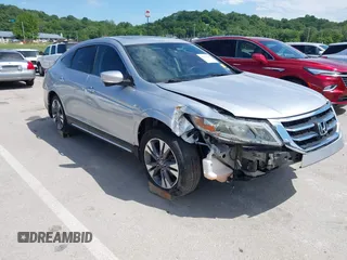 2013 Honda Crosstour EX-L z VIN 5J6TF2H59DL002920, wystawiony jako IAAI lot #42337098 z przebiegiem 122 311 mil mil oraz . Historia ofert i sprzedaży dostępna na DreamBid. Obrazek 1.