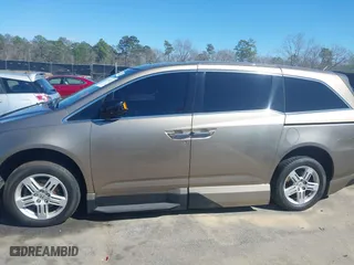 2013 Honda Odyssey Touring with VIN 5FNRL5H96DB066008, listed as a IAAI auction lot 41734055 with 120,292 mi miles. Bid and sale history available at carsss.com. Image 14.